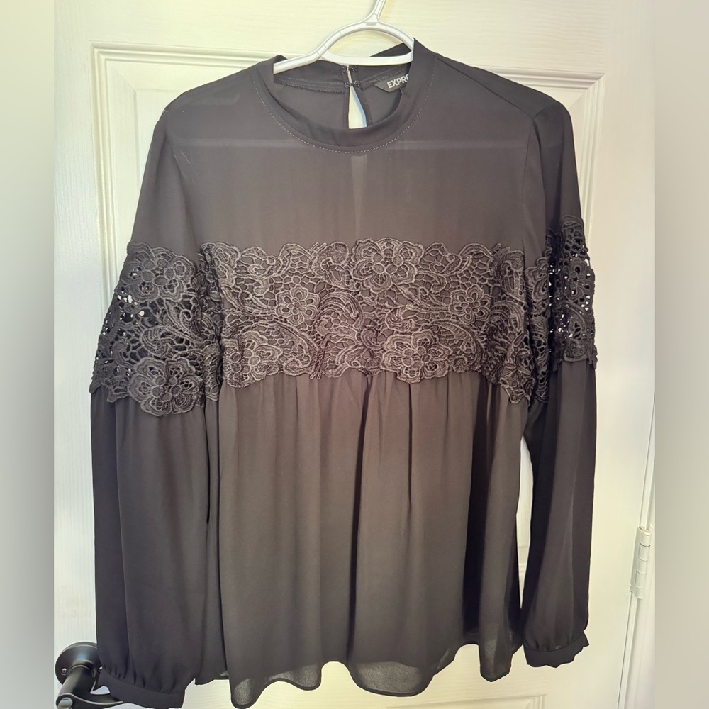 Express size Large NWT black blouse beautiful embroidery in the middle! Perfect